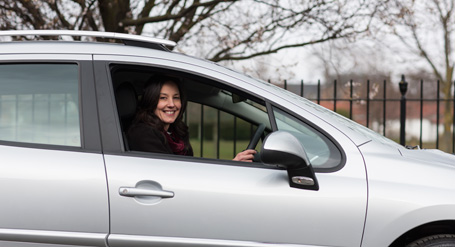 The Revd Canon Carrie Applegath and her Peugeot 207 Estate